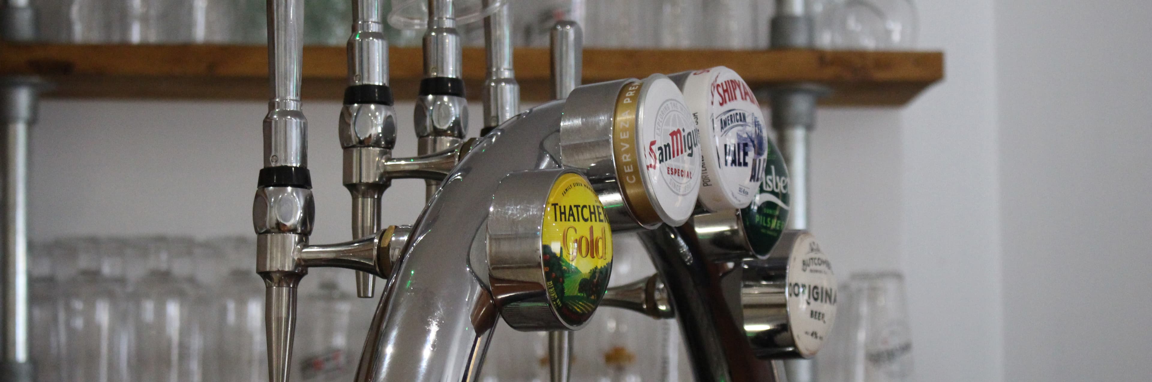 The bar at Camerton Community Hall with a range of draught beers and ciders